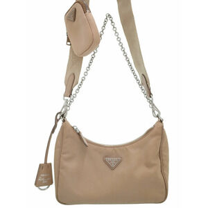 Prada ReEdition 2005 ReNylon bag beige cameo Pink